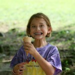 Camp girl eating ice cream cone