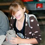 Rockbrook Girls Smiles at Pottery Activity