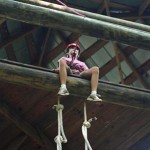 Kid climbing the Alpine Tower
