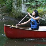 kids canoeing at summer camp