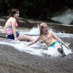 Campers Children sliding rock