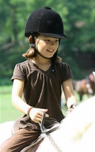 Horse riding summer camp child