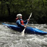 kayak summer camp girl kayaking