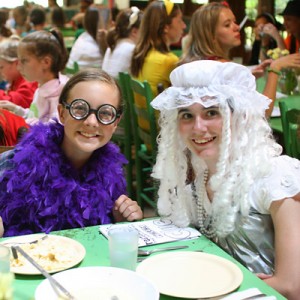 Campers dressed up like clue characters for dinner