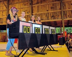 Campers playing quiz show game