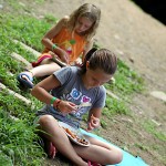 Campers eating barbecue pork picnic