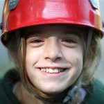 Junior camper ready for rock climbing