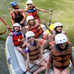 Girl campers having loads of fun rafting the Nantahala