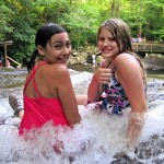 2 camp kids ready to slide the water slide rock